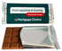 An 80g chocolate bar in a silver wrapper with a logo and green packaging, featuring a milk chocolate interior.