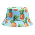 A bucket hat with a light blue background featuring a repeating pineapple pattern and a brand logo.