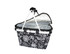 A black and white floral insulated carry basket with a lid and silver lining. It features sturdy handles.