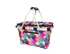 A patterned, insulated carry basket in vibrant colours, featuring a lid and sturdy handles, with a zippered pocket.