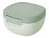 A salad bowl with a light green lid and white base, featuring a logo on the front.
