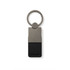 A sleek, black leather keytag with a metallic silver keyring attachment and minimalist design.