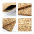 A cork card wallet features natural cork texture, with a black interior and neat stitching along the edges.