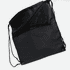 A black drawstring bag with a zippered pocket and adjustable shoulder straps. It features a simple design and has a logo.