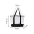 A transparent hand bag with black straps and a solid black base, featuring dimensions of 52cm x 33.5cm x 11.5cm.
