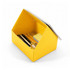 A yellow desk calendar and organiser shaped like a house, filled with pens, sticky notes, and stationery supplies.