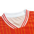 A red half V-neck T-shirt with white and red striped collar and yellow pinstripes, featuring a branding logo.