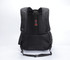 A black backpack featuring padded shoulder straps and mesh detailing. It includes a branding logo on the back.