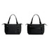 A black tote bag with two handles, featuring a sleek design and a logo. It appears in two angles.