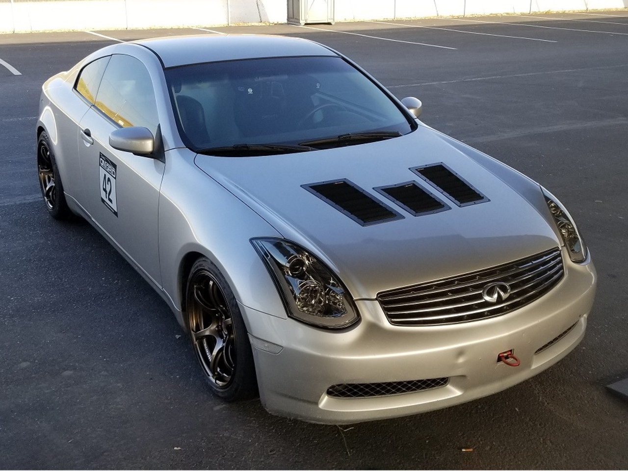 Race Louver RT trim center car hood vent designed for street, high performance driving and light track duty.