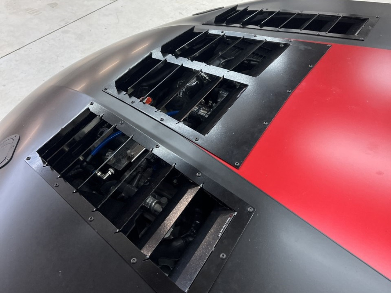 Race Louver RT trim center car hood extractor is designed for street, high performance driving and track duty.