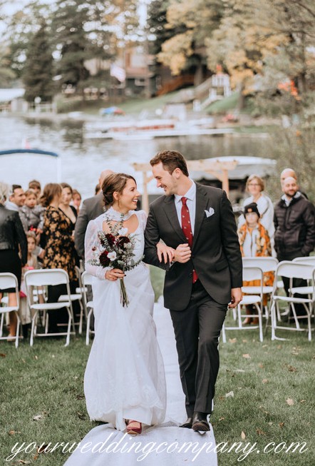 Newly Married Couple Walking Down the Aisle