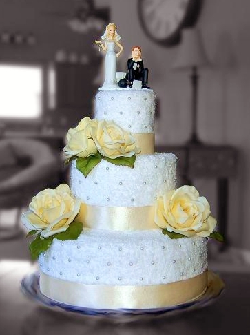 White and Yellow Towel Cake