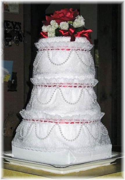 White and Red Towel Cake