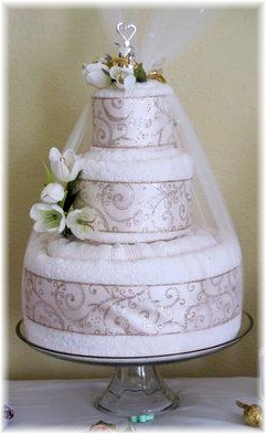 White Towel Cake with Silver Ribbon