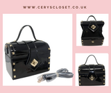 Black Patent Treasure Chest Shaped Handbag with Gold Studded Detail and Detachable Shoulder Strap at Cerys' Closet