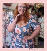 1950s vintage inspired full circle dress by Cerys' Closet. Made in the UK. Dress can be worn with or without the petticoat. Has a 4 panel full circle skirt with seam pockets, a sweetheart neckline and sleeves.

Stunning cornflower blue background with peach/ pink  and white floral print, ideal as an alternative wedding dress, wedding guest dress and bridesmaid  dress.  worn by @miss.spoonfulofsugar