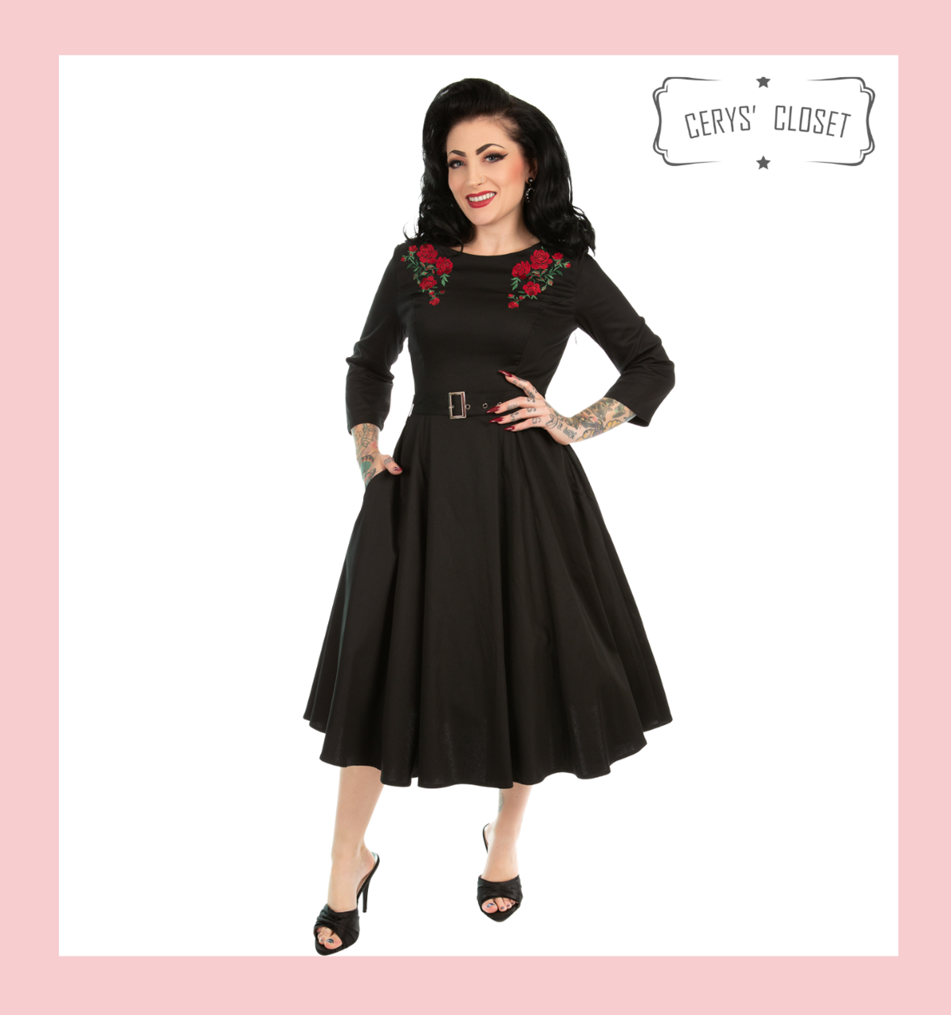 black dress with three quarter length sleeves