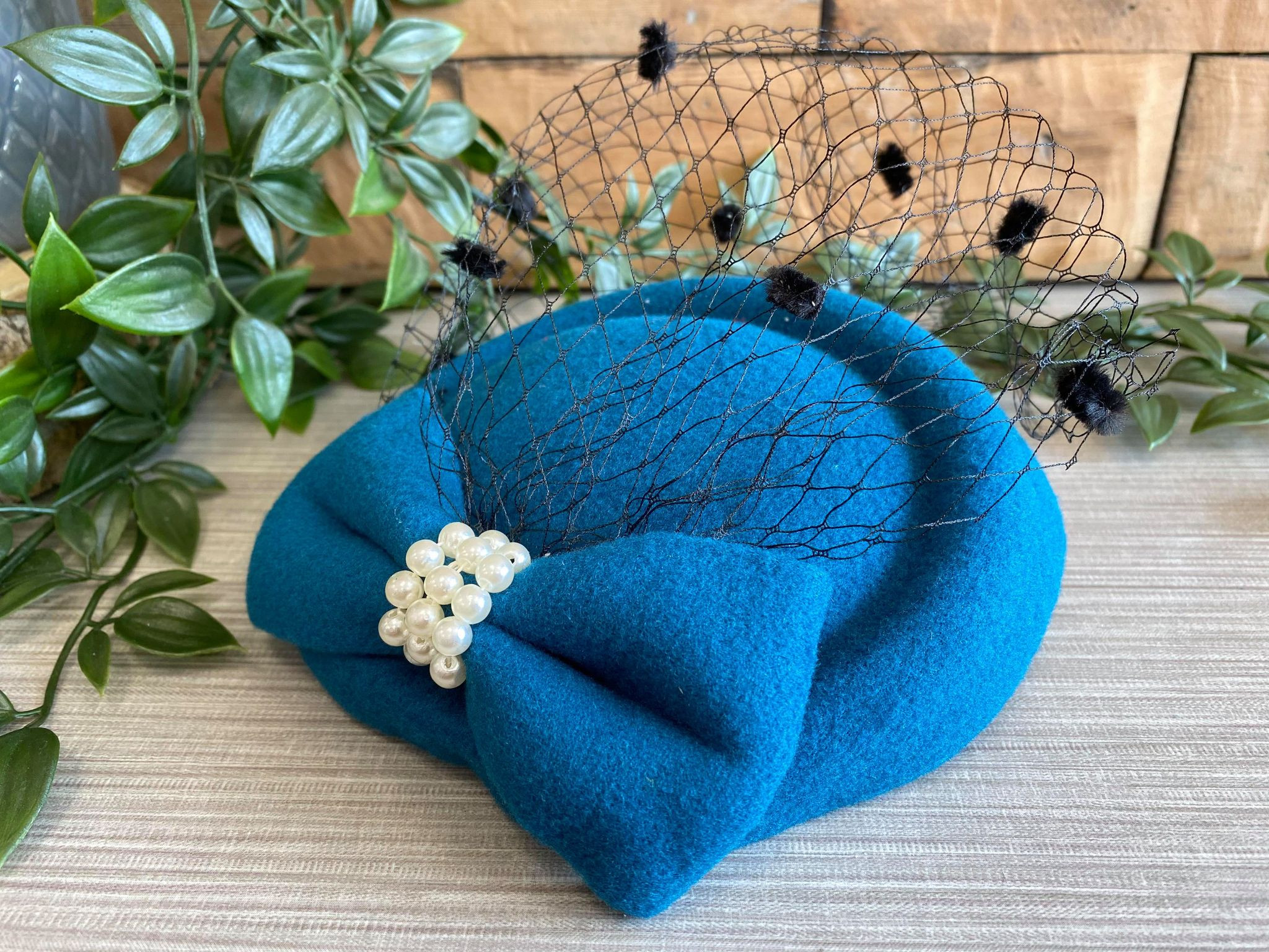 teal hat box with bow