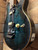 Pre-owned Sterling by Musicman Axis AX5QM Yucatan Blue