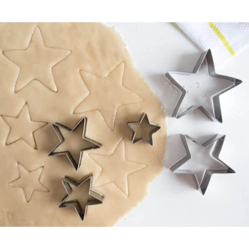 Fox Run Star-shaped Cookie Cutters in a tin storage can.  Set of 5 cookie cutters. Fox Run Star-shaped Cookie Cutters in a tin storage can.  Set of 5 cookie cutters.