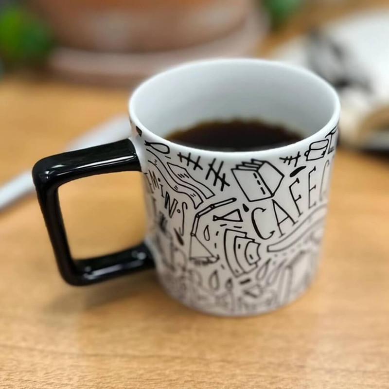 Katie Merz 14 oz Black Mug with White Glyph Art Katie Merz 14 oz Black Mug with White Glyph Art