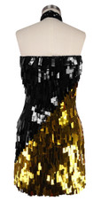 A short handmade sequin dress, in rectangular Black and gold paillette sequin dress in back view