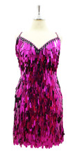 In-Stock Handmade Short Dress In Fuchsia Tear Shaped Metallic Sequins.

SIZE: US 16 / UK 18 / EUR 48 (Measurements are shown as inches)
BUST: 43
WAIST: 36
HIPS: 46
G: 20 (mid top of shoulder to waist)
SL1 Length: 18
Sleeves Length:
Order slightly larger if unsure as you can adjust down in sizing with a seamstress local to you once your item arrives. (Normally we leave about 1 inch of fabric on inside seams to allow you to let an item out slightly.)

Lining: yes
 
Stretch: yes (1 to 2 inches across body) 
 
Composition: P.E.T. sequins on 95% polyester 5% spandex base 
 
Care: Cold water delicates or hand wash: test first. Dry flat. Do not iron.