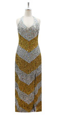 In-Stock Long Handmade Hologram Gold and Silver 8mm Sequin Gown

SIZE: US 12 / UK 14 / EUR 44 (Measurements are shown as inches)
BUST: 39
WAIST: 32
HIPS: 42
G: 19.5 (mid top of shoulder to waist)
H Dress Hemline Length: 62
Slit: 26