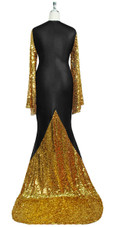 Oversized sleeve gown in metallic gold sequin spangles fabric and black stretch fabric with flared hemline front view
