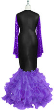 Oversized sleeve gown in metallic purple sequin spangles fabric and black stretch fabric with purple organza ruffles hemline front view