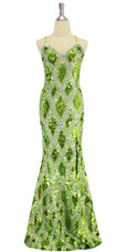 Long handmade sequin dress in flat metallic light green, hologram green and hologram silver sequins with faceted beads in a geometric pattern with a flared hemline front view