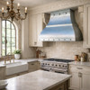 Elegant European style kitchen with a custom architectural zinc range hood with riveted detail and flared canopy