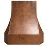 Faceted bell copper range hood with chamfered rectangular apron and compact chimney