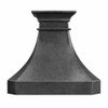 Dark hammered zinc range hood with tiered crown and tapered canopy as a focal point