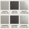 Finish and texture options available for a dark hammered zinc range hood with tiered crown and tapered canopy