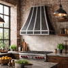 Industrial zinc range hood with vertical straps in an urban style kitchen