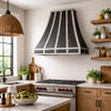 Modern kitchen with a farmhouse falvour with an industrial zinc range hood with vertical straps