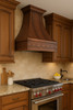 Traditional kitchen with a solid copper range hood 