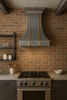 Industrial style kitchen with a custom zinc brass metal range hood