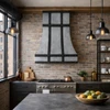 Brushed zinc range hood with dark straps in an urban industrial kitchen with exposed brick and black lighting