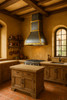 Handcrafted brushed zinc range hood with brass straps in a Tuscan style kitchen setting