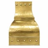 Gold brass range hood with polished rivets shown from the side for a kitchen island installation
