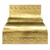 Gold brass range hood with polished rivets, reflective bell shape, and handcrafted metal finish