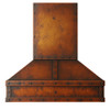 Rustic copper kitchen range hood with industrial look and rivets front view