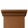 Close-up of hammered copper crown molding with layered trim on a white background