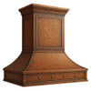 Angled view of a lightly hammered copper range hood