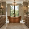 Hand hammered double slipper copper bathtub for two in transitional bathroom with wood vanities,  warm stone tile and separate shower