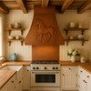 Copper range hood with a horse in a country style kitchen