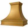 Tuscan brass range hood detail with crown molding and apron trim, warm golden brass surface with flared handcrafted canopy, angled view